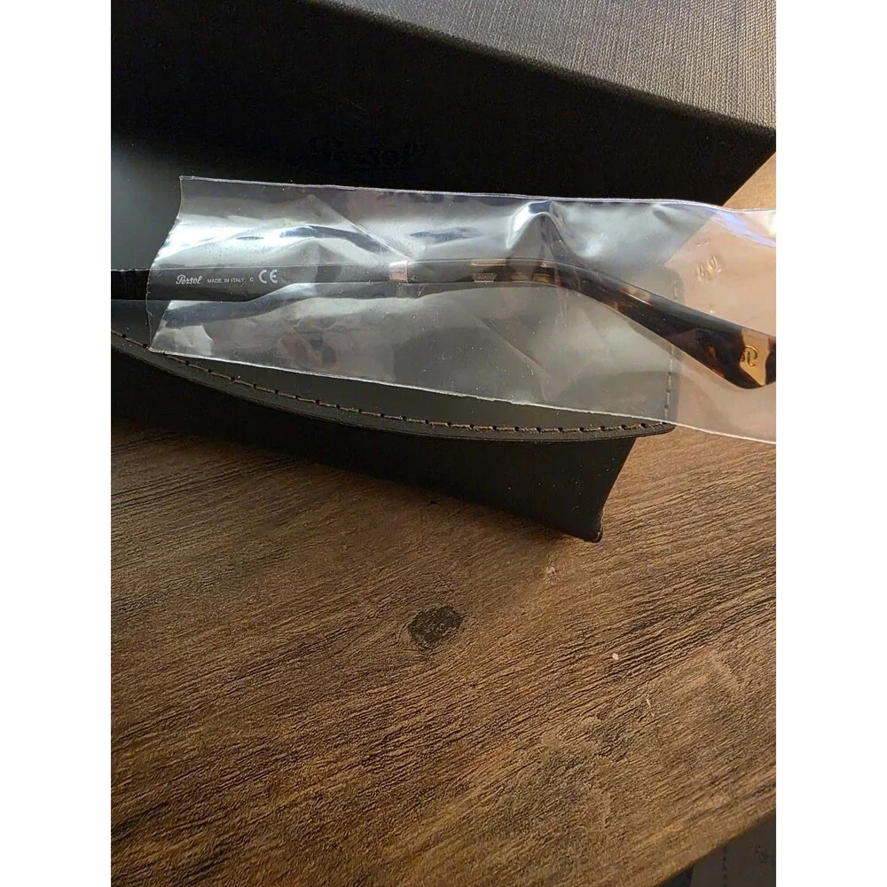 Persol Black Round Sunglasses with Dark Lenses